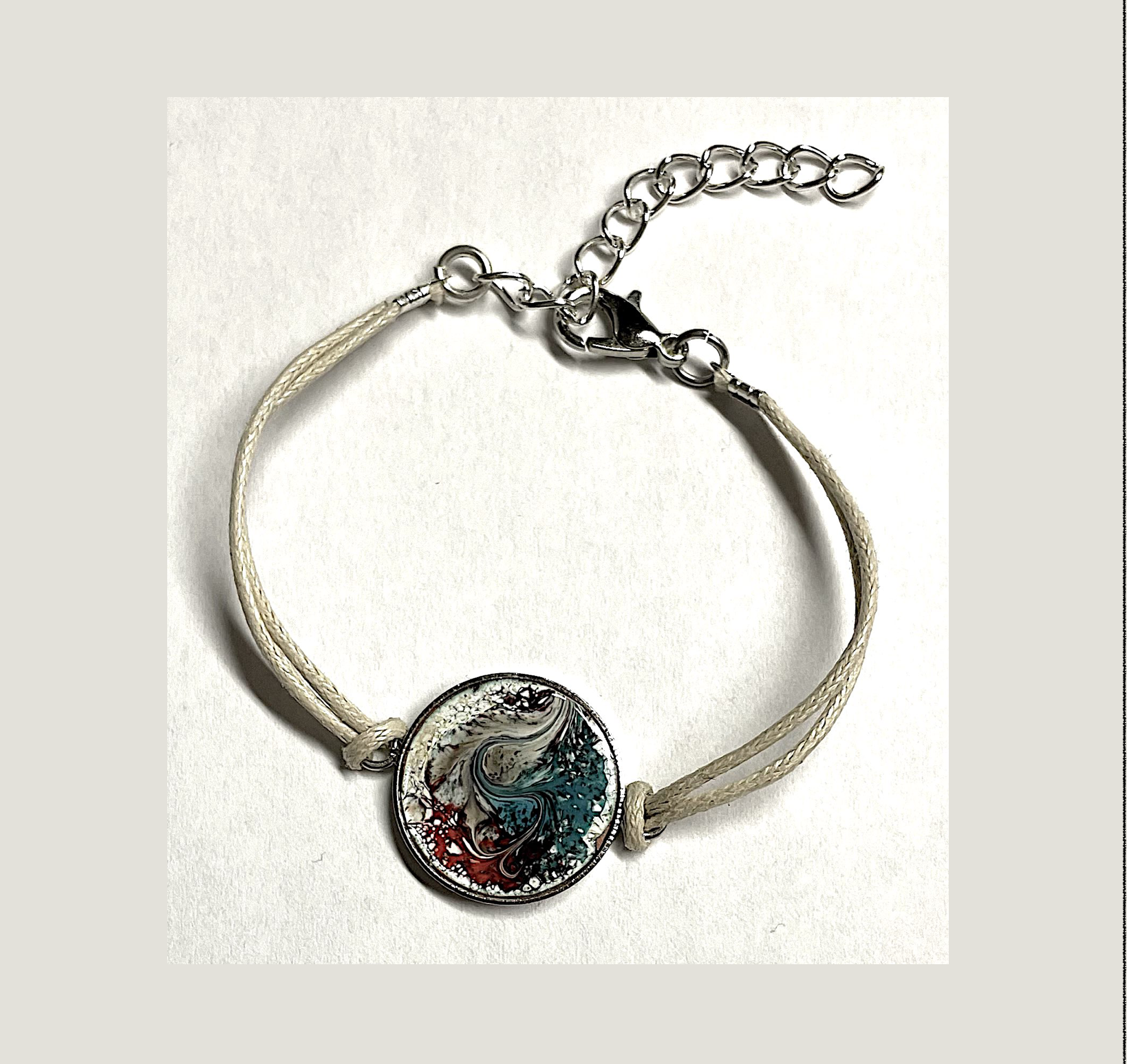 Categorie bracelet Bracelet réglable diamètre du médaillon 25 mm couleurs : bleu, modèle terre et mer